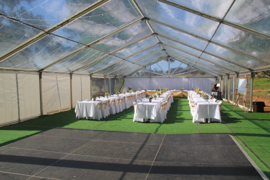 10m by 24m clear marquee with astro turf