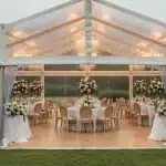 Outdoor wedding marquee in Perth providing elegant rain protection during a wedding reception