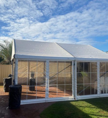 A photo of a marquee with clear walls.